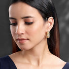 Sparkle & Shine CZ Hoop Earrings. Gold-plated hoop earrings with cubic zirconia stones from Peora.