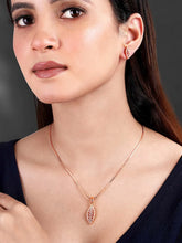 Leaf-Inspired Allure CZ Pendant Set by Peora. Rose gold-plated pendant set with leaf-inspired design & earrings.