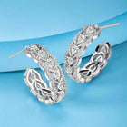 Sparkle & Shine CZ Hoop Earrings. Silver-plated hoop earrings with cubic zirconia stones from Peora.