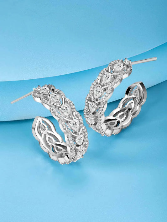 Sparkle & Shine CZ Hoop Earrings. Silver-plated hoop earrings with cubic zirconia stones from Peora.