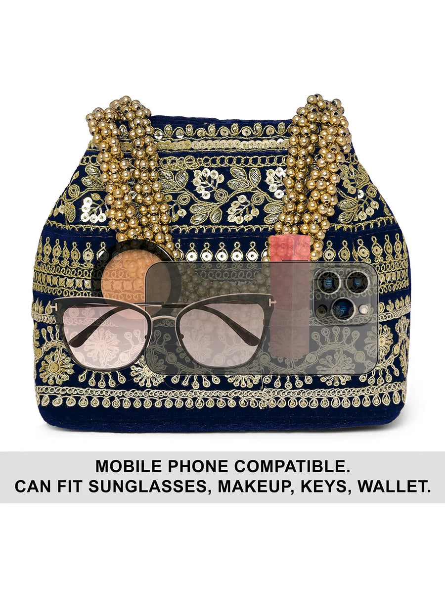 Blue potli bag named Chic & Glamorous Potli Collection, featuring artificial beads detailing and soft fabric texture | Peora
