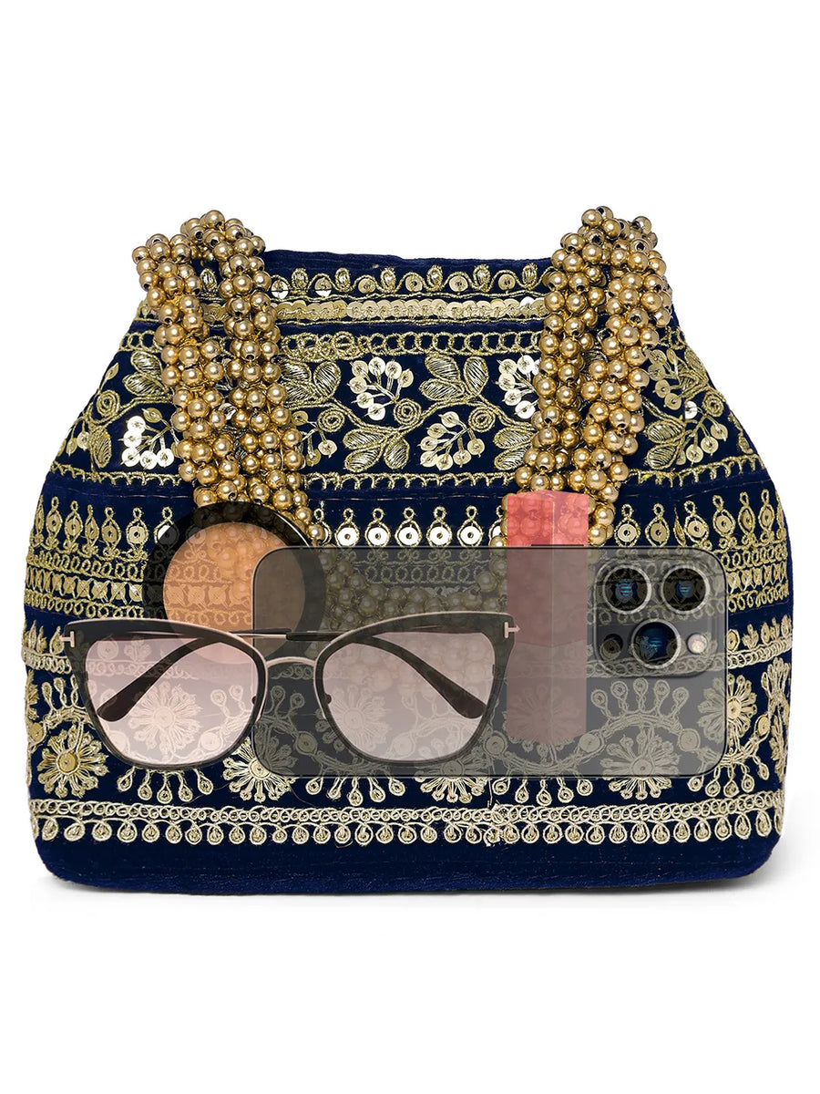 Blue potli bag named Chic & Glamorous Potli Collection, featuring artificial beads detailing and soft fabric texture | Peora
