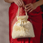 Exquisite Charming Embroidery Potli - Golden