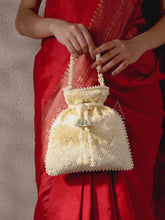 Exquisite Charming Embroidery Potli - Golden