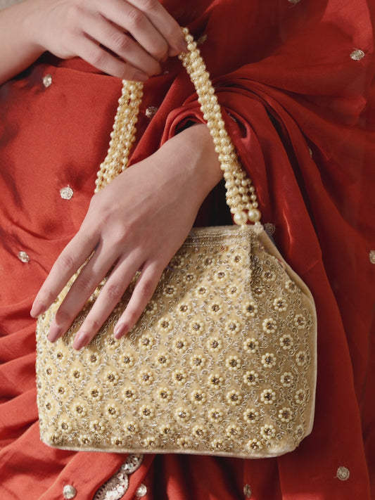 Vintage Pearl Embellished Potli - Gold